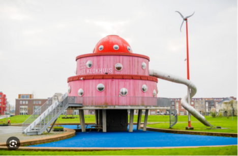 Afbeelding van het roze gebouw Het Klokhuis